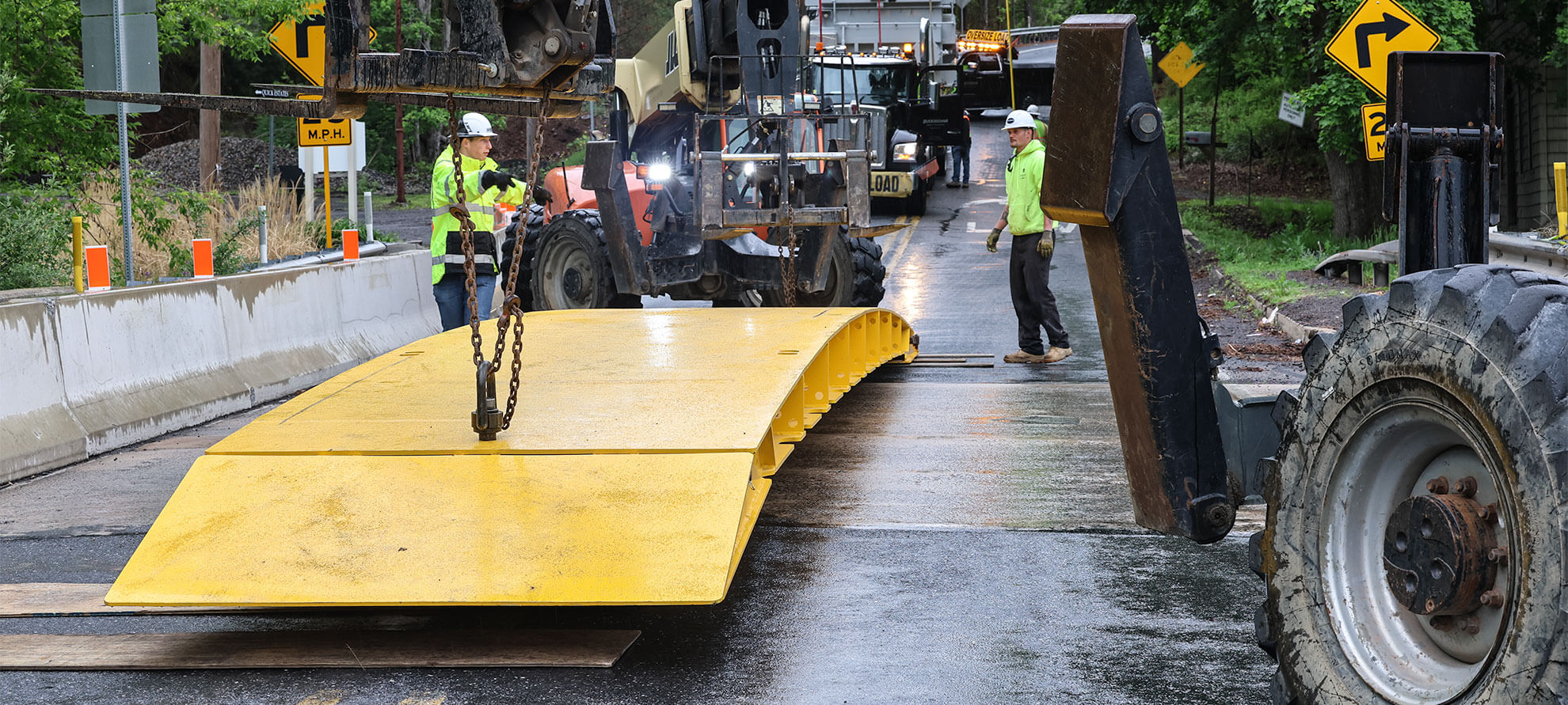 Buckingham sets yellow temporary bridge using JLG